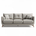 Beige fabric sofa with wooden legs and three plush cushions 220 x 90 x 85cm